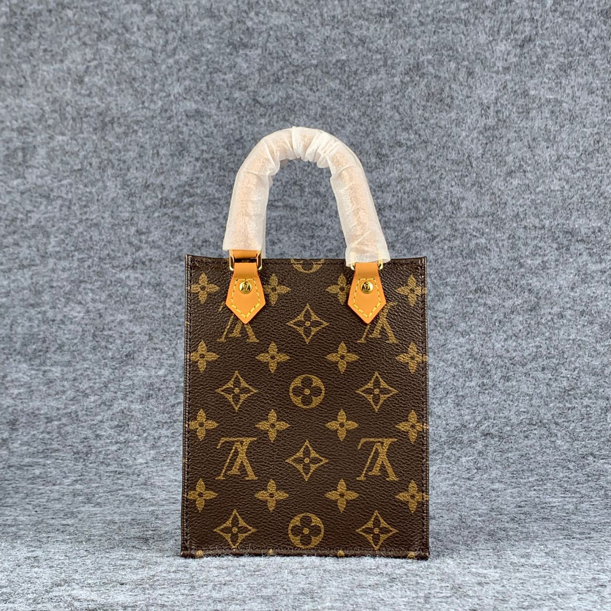 LV PETIT SAC PLAT  BROWN