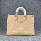 LV Onthego MM Beige Monogram Empreinte Tote Bag